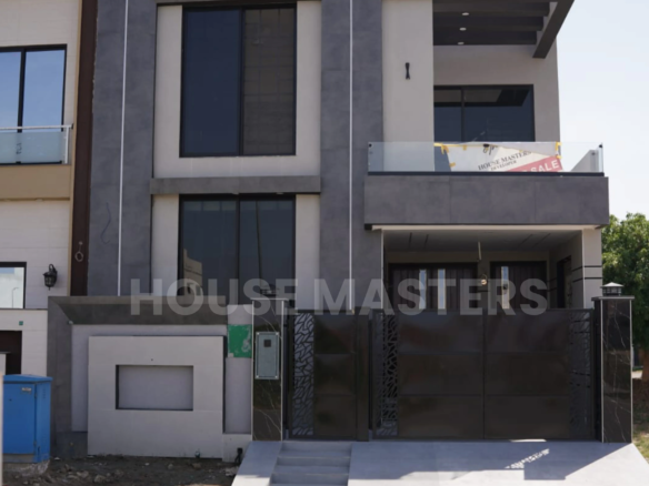 Modern facade of a 5 Marla residence in Bahria Orchard with stylish entrance