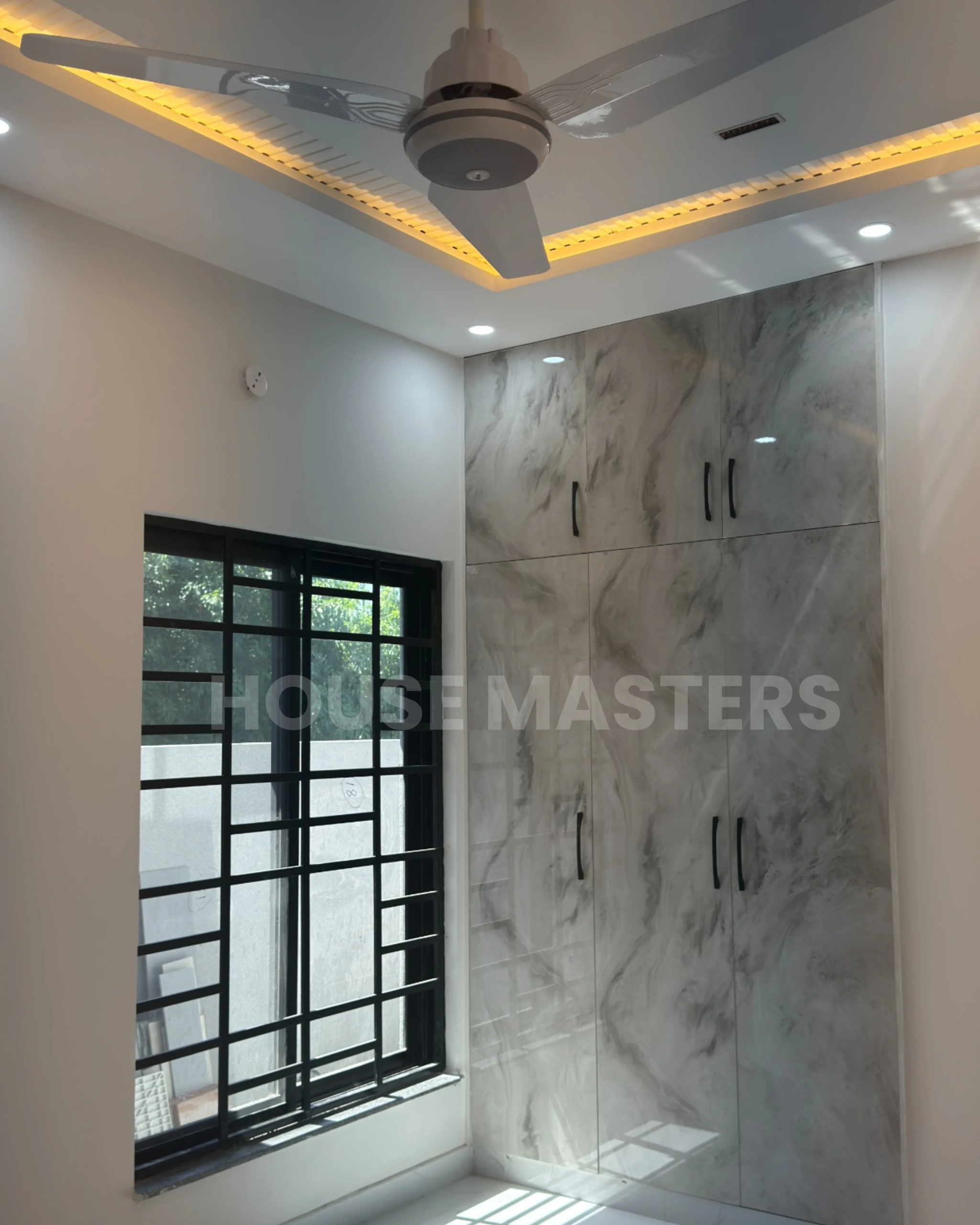 Spacious living room with ceiling lights and contemporary design in a 5 Marla home