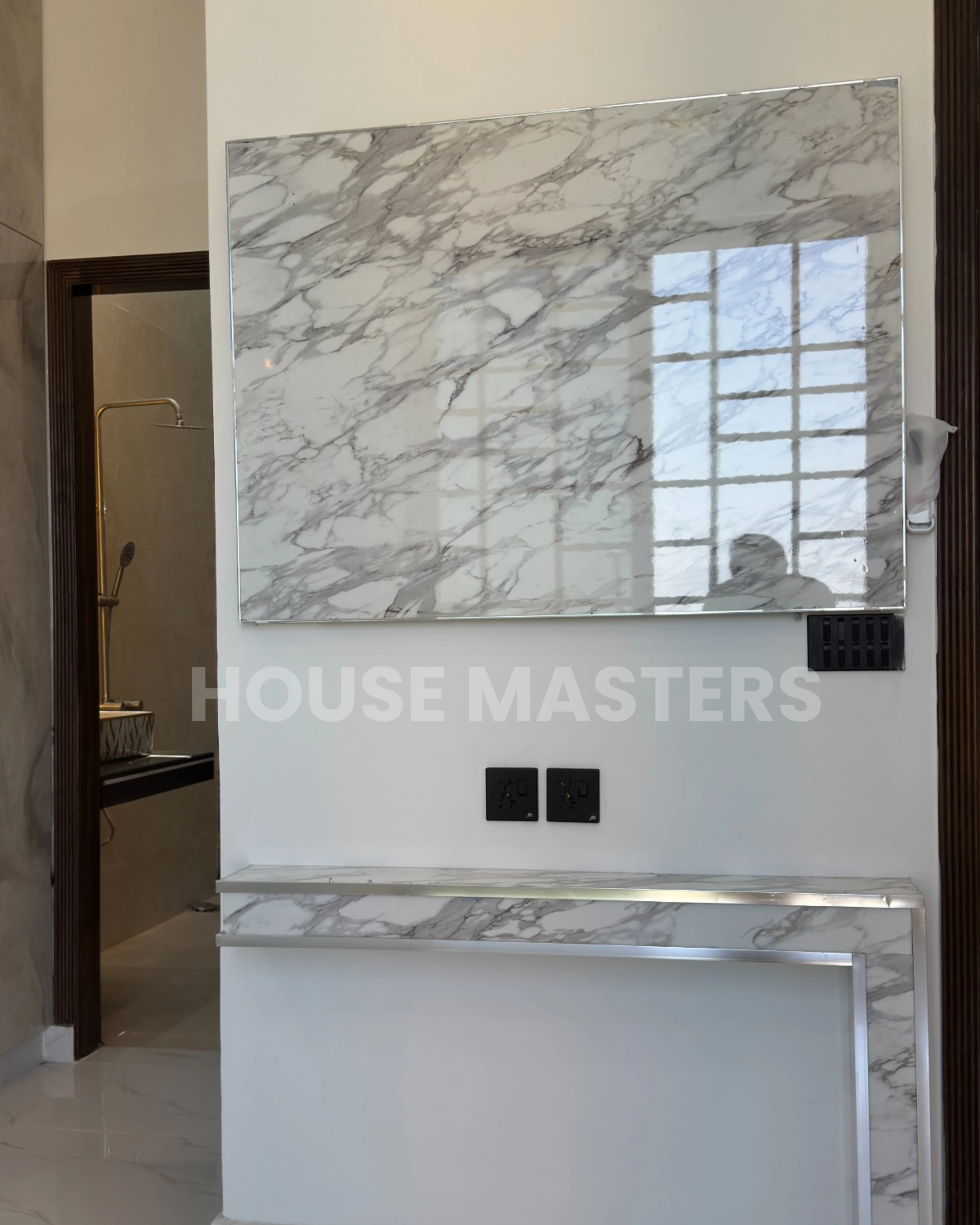 Elegant marble bathroom with modern fixtures in a 5 Marla home