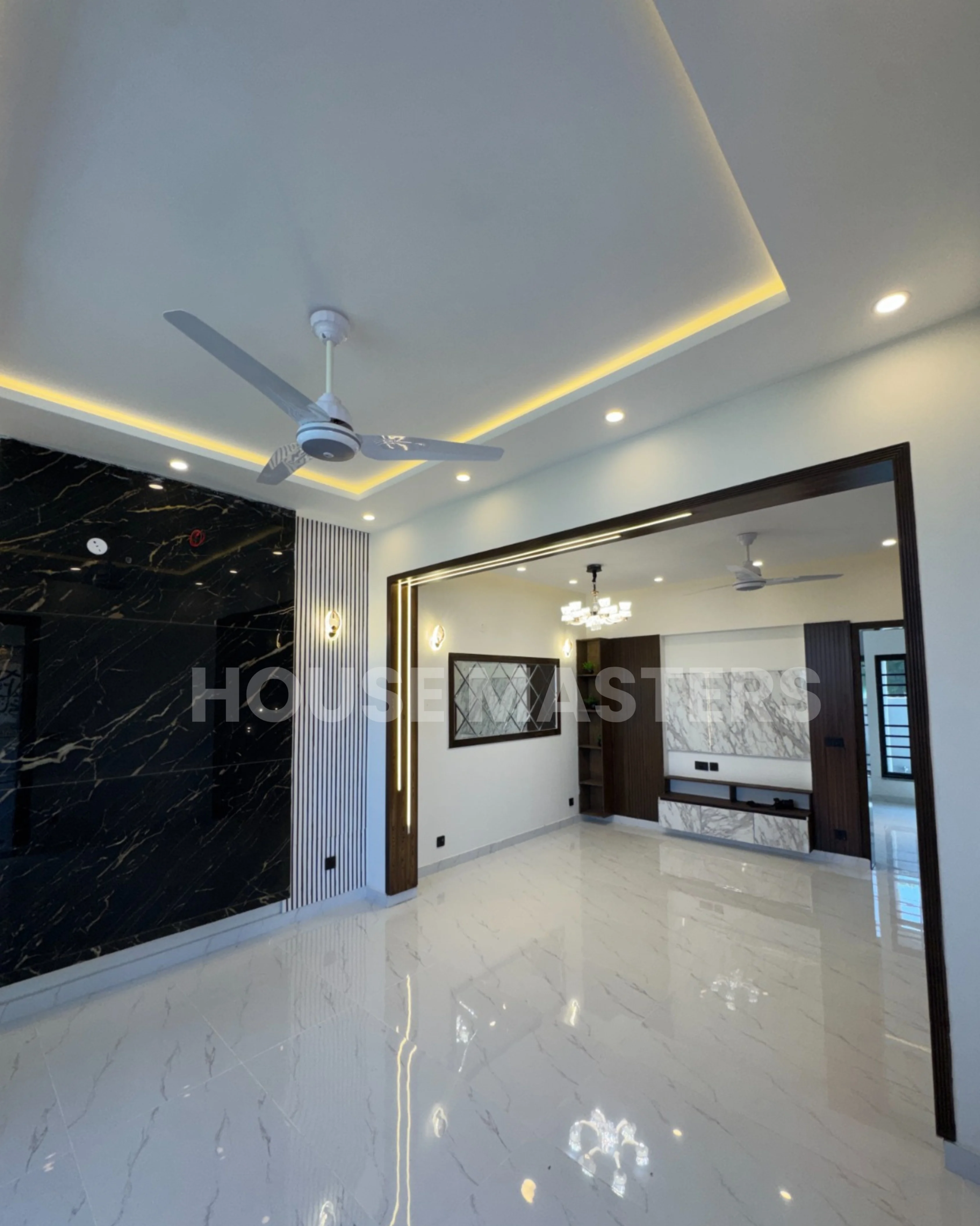 Elegant feature wall with modern lighting in a 5 Marla home