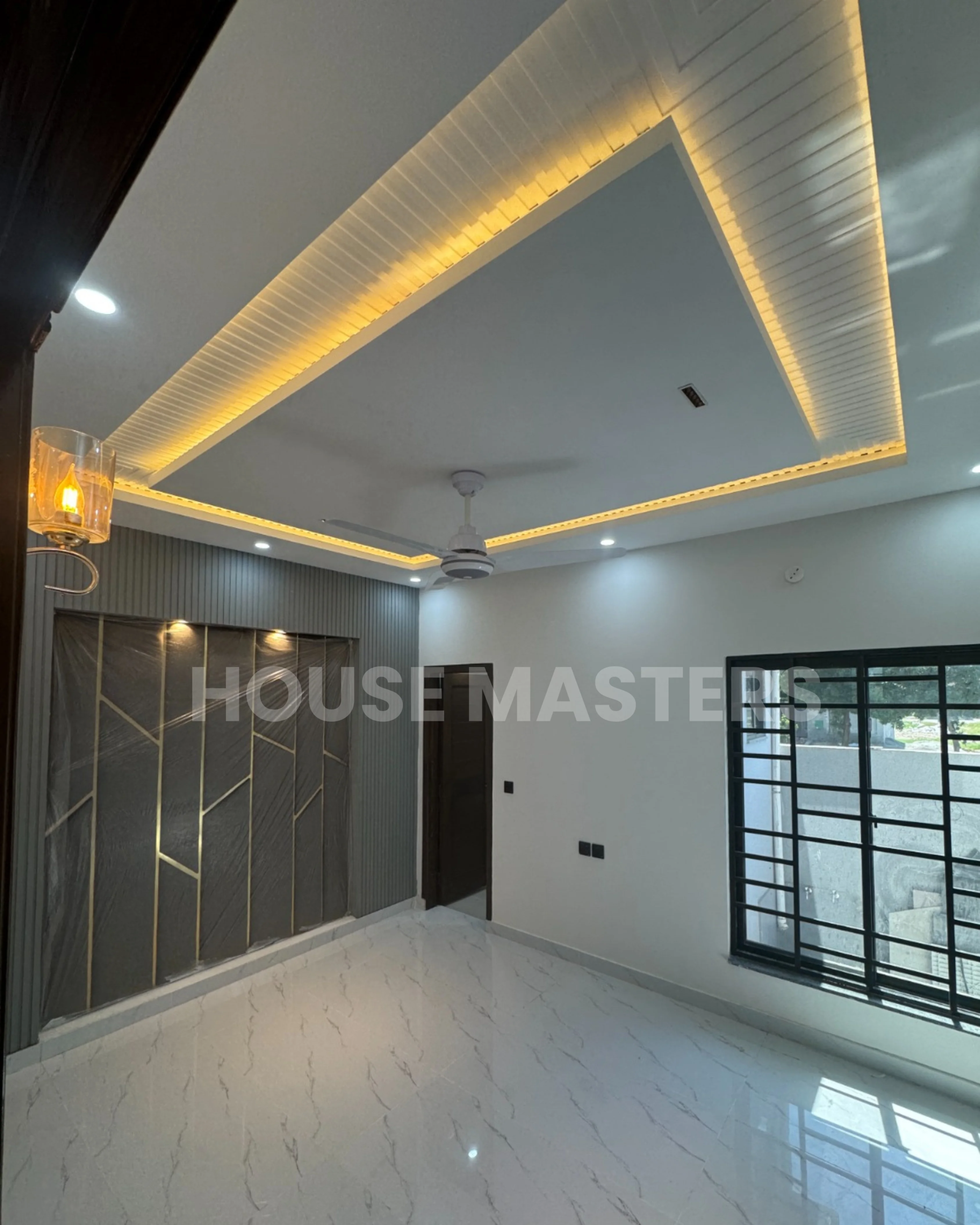 Luxurious living room with ceiling lights and modern design in a 5 Marla home