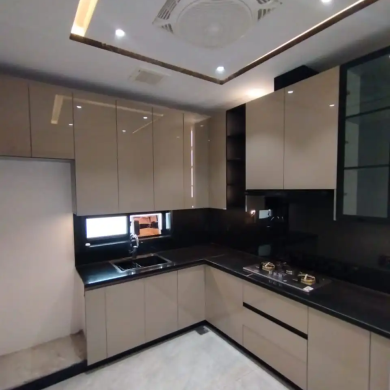 Modern L-shaped kitchen layout with cabinets in 5 Marla luxury house