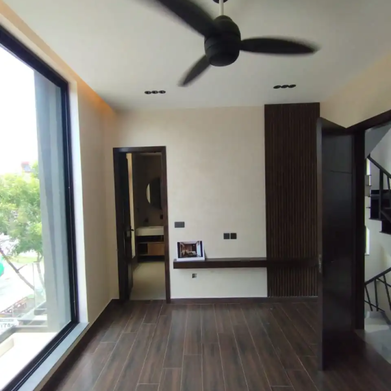 Elegant TV lounge custom wall paneling design layout