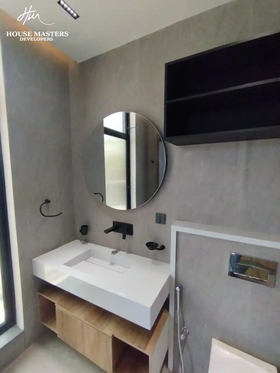 5 Marla Modern House for Sale in DHA Rahber Lahore Contemporary bathroom design with gray tiles and floating white vanity